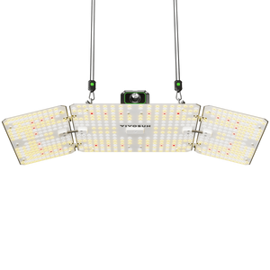 Hinged LED grow light with three rectangular panels, hanging ropes, and an illuminated diode grid against a black background.