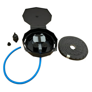 AQUAbox Spyder kit: black octagonal watering box, blue tubing, and capillary matting for raised bed irrigation.