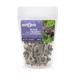 A clear plastic pouch of North Spore dried wild black trumpet mushrooms with a label showing the fresh fungi.