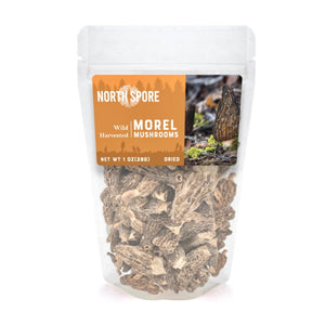 Clear plastic pouch of dried, textured brown North Spore wild morel mushrooms with an orange label.