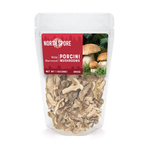 A 1oz clear pouch of North Spore dried, sliced wild porcini mushrooms with a red product label featuring mushrooms.