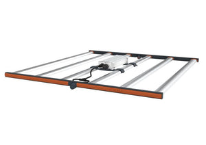 Fluence SPYDR 2r LED grow light: a flat, rectangular metal fixture with silver tubes and orange accents for indoor plants.