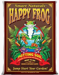 A brown bag of FoxFarm Happy Frog Potting Soil featuring a green frog illustration, designed for indoor/outdoor plants.