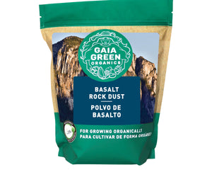 A bag of Gaia Green Basalt Rock Dust with green packaging and a mountain landscape graphic, used for organic gardening.