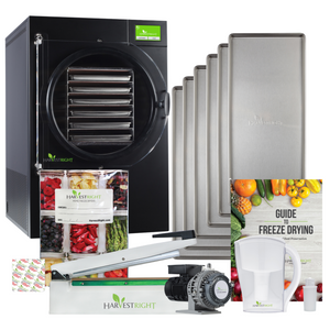 Harvest Right large 6-tray black home freeze dryer with stainless steel trays, vacuum pump, sealer, and preservation kit.