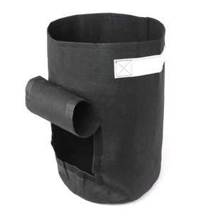 Black fabric potato grow bag with reinforced side handles and a convenient access flap for easy harvesting.