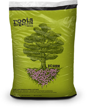 A 1 cu ft green plastic bag of Roots Organics Big Worm earthworm castings fertilizer with a tree and root illustration.