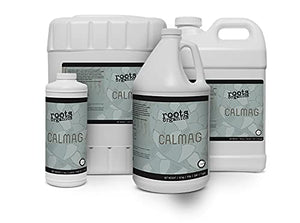 Multiple white plastic jugs of Roots Organics CalMag plant supplement for hydroponics, shown in various sizes.