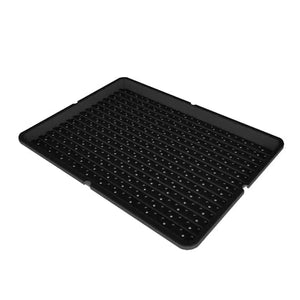 Black plastic Tray2Grow microgreen tray with drainage holes for hydroponic planting and plant propagation.
