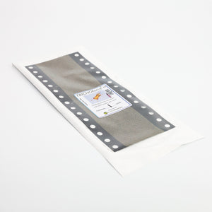 Trichogramma minutum parasitic wasp egg card in a white, film-strip style sleeve for pest control.