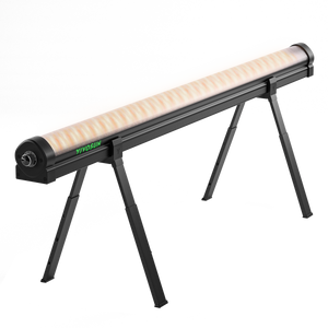 Black cylindrical grow light on a folding stand with warm glowing LED tube and green Vivosun logo.