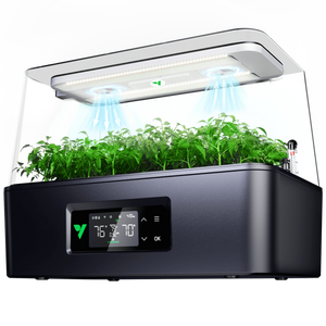 Black hydroponic grow box with green plants, digital display, overhead light panel, and visible airflow.