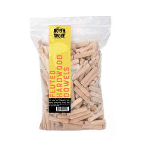 A clear plastic bag filled with light brown, fluted wooden dowels, featuring a yellow North Spore label.