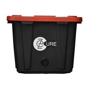 EZTRIM EZ Cure black plastic automated curing bin with a red lid and white logo.