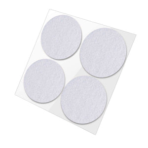 Four round, white felt furniture pads on a clear backing sheet.
