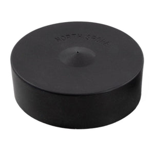 Black silicone injection port cap with "NORTH SPORE" debossed on top and a small center nipple.