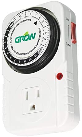 White electrical outlet timer with a circular 24-hour dial, side switch, and red indicator light on a white body.