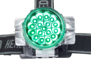 Green LED headlamp with silver side heat sinks and adjustable black head strap, shown from a front-facing angle.