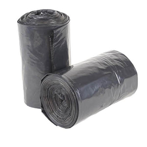 Two tightly wound rolls of opaque black plastic bags positioned against a plain white background.