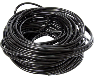 Coiled, black flexible irrigation tubing for hydroponic systems against a white background.