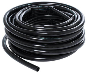 Coiled length of shiny black irrigation tubing on a white background, featuring white text printed along the side.