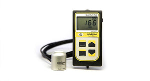 Apogee quantum flux meter with digital display, yellow buttons, and attached silver light sensor on a white background.