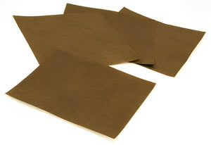 Three rectangular sheets of textured brown horticultural fabric fanned out against a white background.