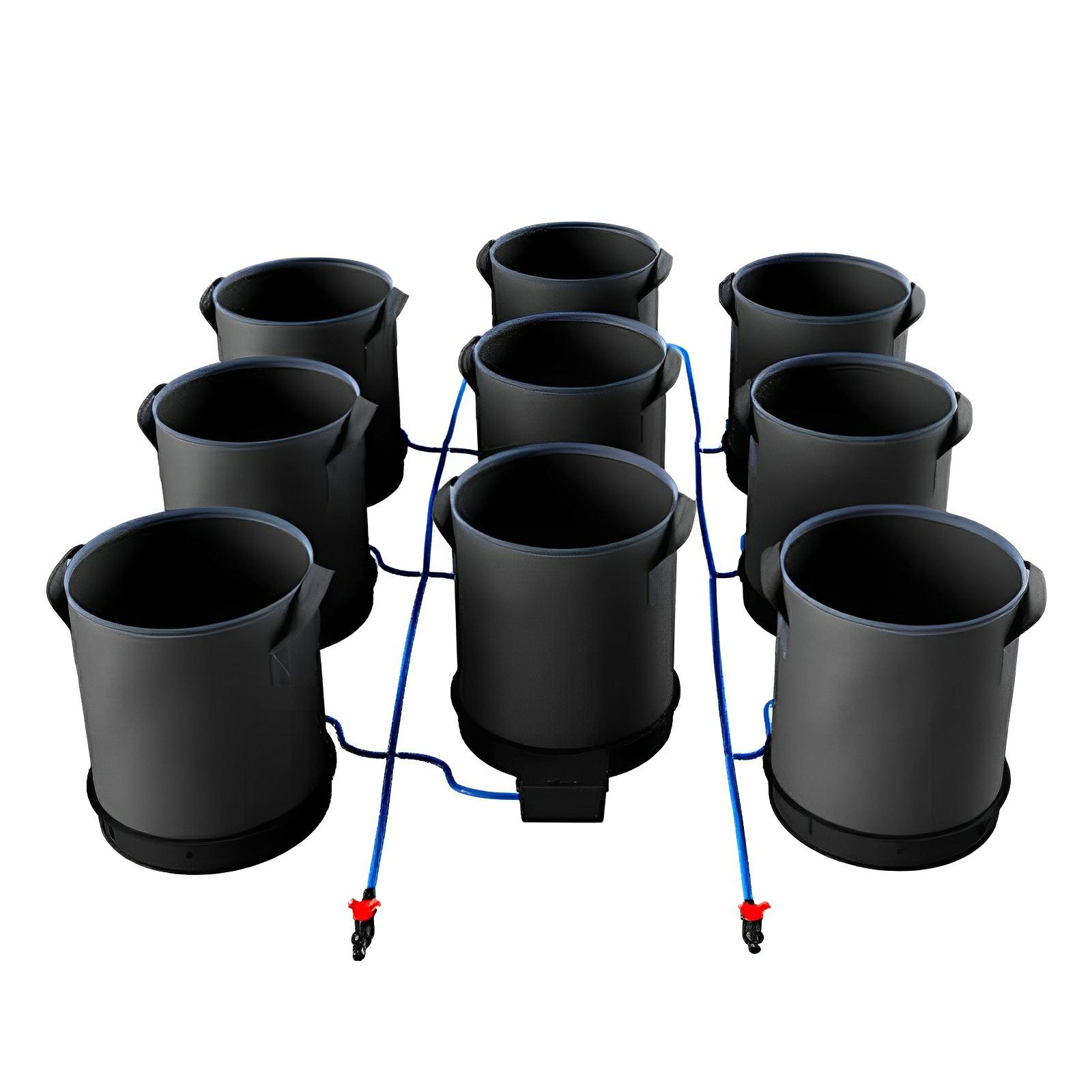 Eight black fabric grow pots connected in a grid by blue irrigation tubing with red valves on a white background.