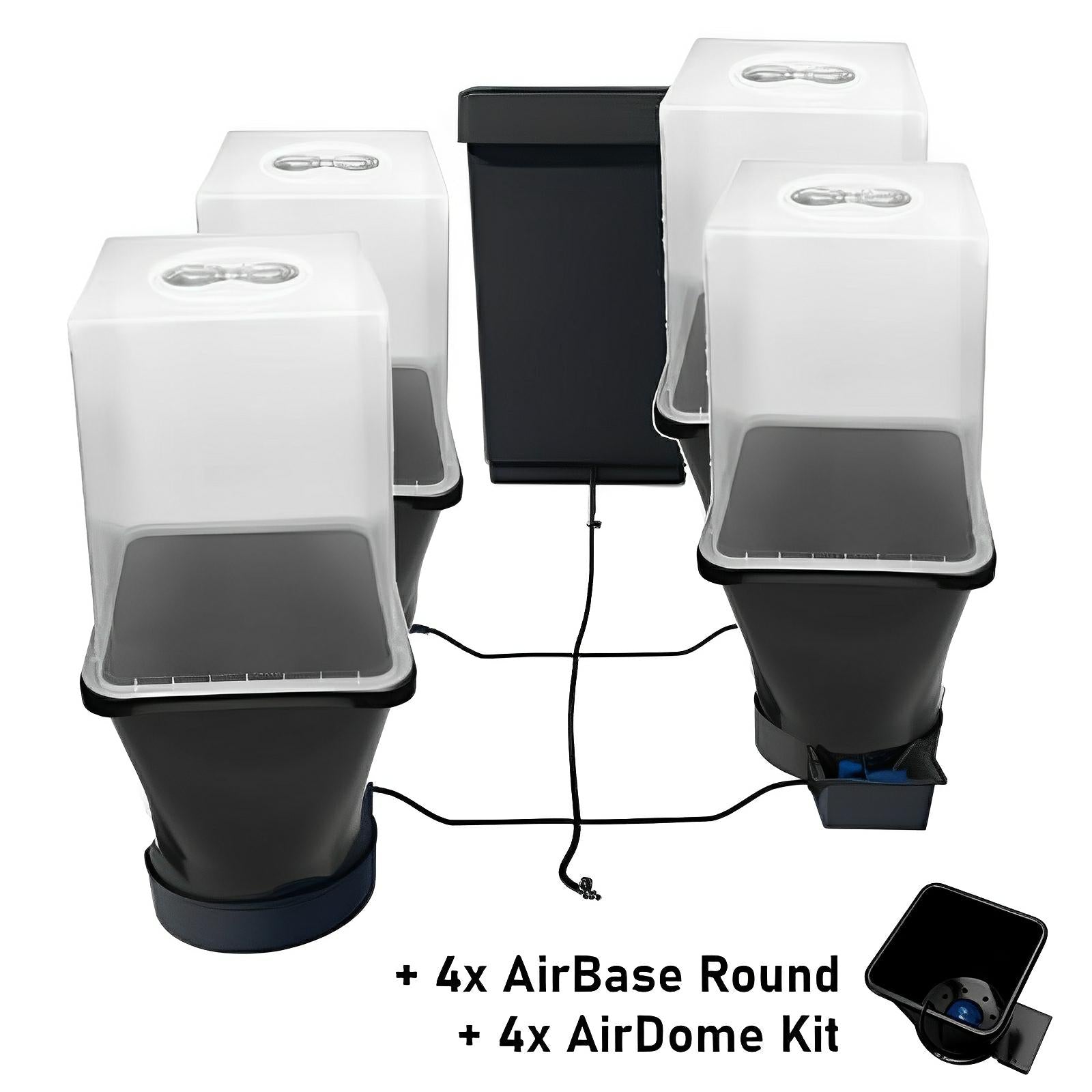 Autopot 4-pot self-watering system with black reservoirs and four white square propagator covers connected by tubing.