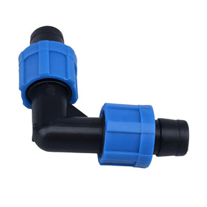 Black L-shaped elbow irrigation fitting with two blue locking compression nuts on a white background.