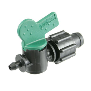Black Irritec drip irrigation valve with a green butterfly handle and barbed connector on a white background.