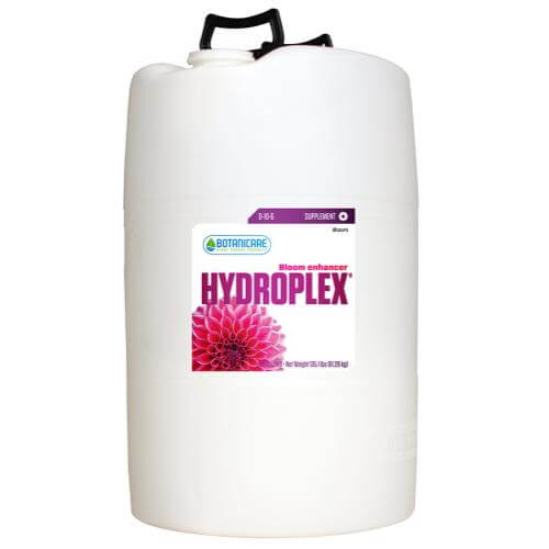 Large white plastic jug of Botanicare Hydroplex bloom enhancer with a black handle, isolated on white.