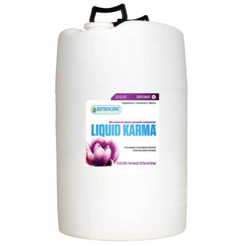 Large 5-gallon white plastic jug of plant nutrient supplement with a black carry handle.
