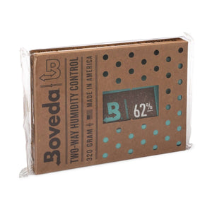 Boveda 320g two-way humidity control packet in a brown, perforated sleeve with teal interior visible.