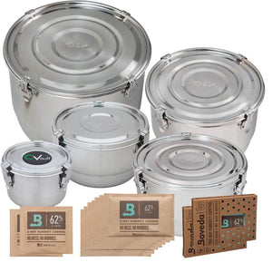 Four stainless steel CVault storage containers of varying sizes with Boveda 62% two-way humidity control packs.