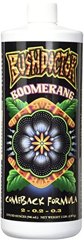 32oz white bottle of Bushdoctor Boomerang plant supplement with black label and central flower graphic.
