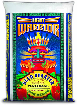 One cubic foot bag of Light Warrior seed starter with vibrant tribal mask graphics and detailed product information.