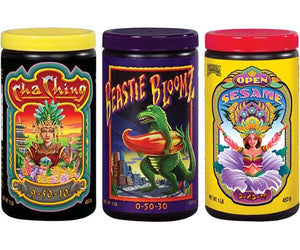 Three FoxFarm plant fertilizer jars labeled Cha Ching, Beastie Bloomz, and Open Sesame on a white background.