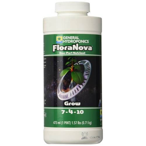 A white 473ml bottle of FloraNova Grow 7-4-10 nutrient with a green label featuring a plant graphic on a space background.