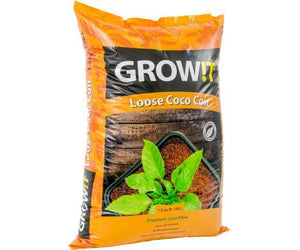 Orange and black bag of Grow!t Loose Coco Coir featuring a green plant in a tray on a wooden surface background.