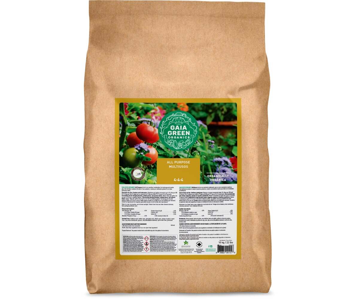 Brown paper bag of Gaia Green 4-4-4 All Purpose fertilizer with a label showing tomatoes and garden flowers.
