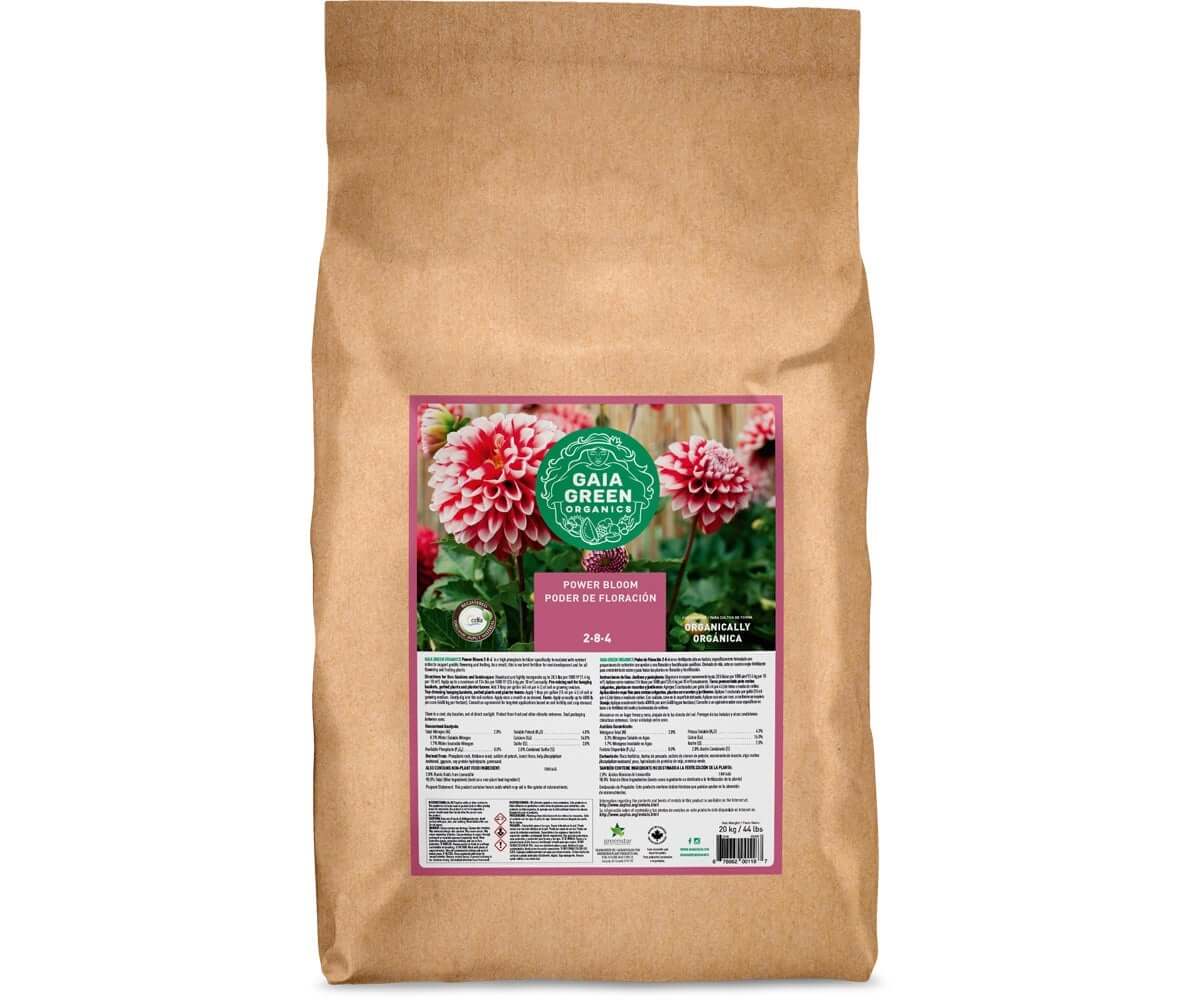 20kg brown paper bag of Gaia Green Power Bloom fertilizer with a label showing pink dahlias and 2-8-4 nutrient ratio.