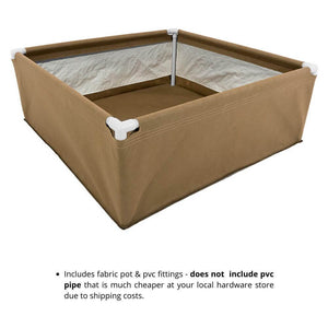 Tan fabric bed with white PVC corner connectors for a DIY grow tray, viewed from a high angle.