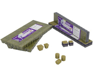 Grodan rockwool starter plugs and mini-blocks in sheets with loose plugs shown in the foreground on white background.