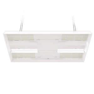 Low-angle view of a rectangular white LED grow light fixture with four quantum board panels and suspension cables.