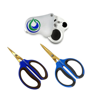 Two pairs of blue-handled stainless steel trimming scissors and a silver handheld LED jeweler's loupe.