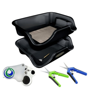 Black two-piece trim tray with mesh screen, cleaning brush, handheld magnifier, and two spring-loaded trimming shears.