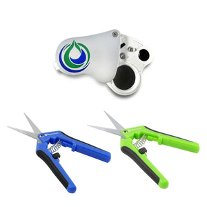 A silver pocket magnifier with logo alongside two spring-action trimming shears with blue and green ergonomic handles.