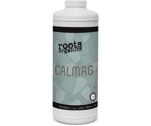 White 950ml bottle of Roots Organics CalMag plant supplement with a light blue label featuring floral patterns.