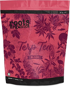 Roots Organics Terp Tea Bloom 3-7-4 in a pink stand-up pouch with dark purple floral and botanical illustrations.
